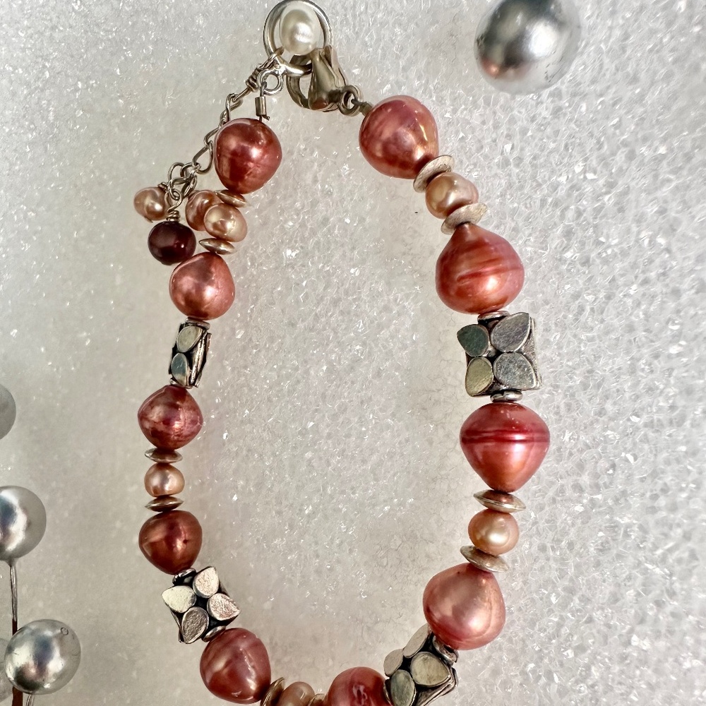 Handmade Pearl & Silver Bracelet w/lobster claw clasp. Peach & Coral colors.